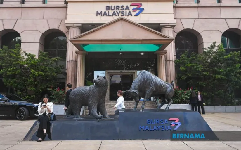 Electronic share-price display illustrating Malaysian stock market trading
