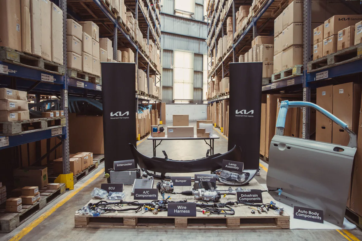 Shelves of packaged automotive spare parts inside a warehouse
