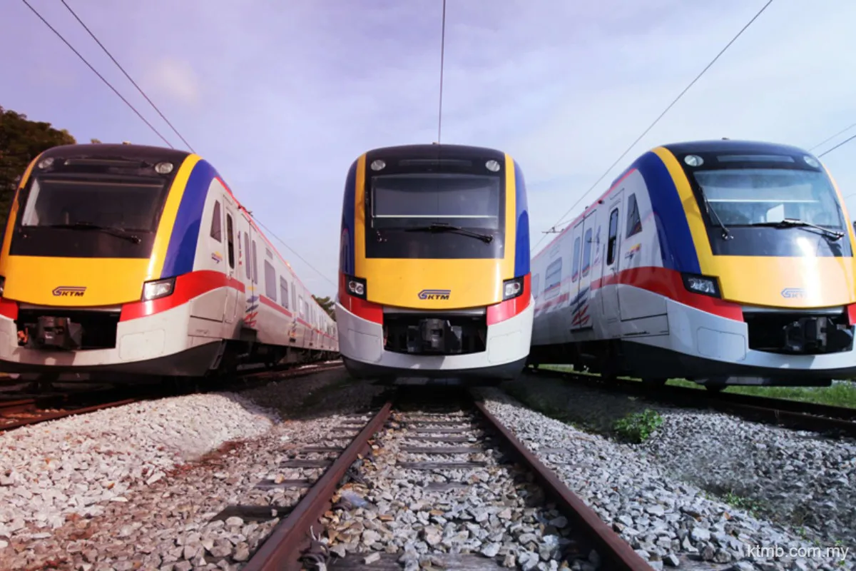 Passenger train beside a railway platform in Johor
