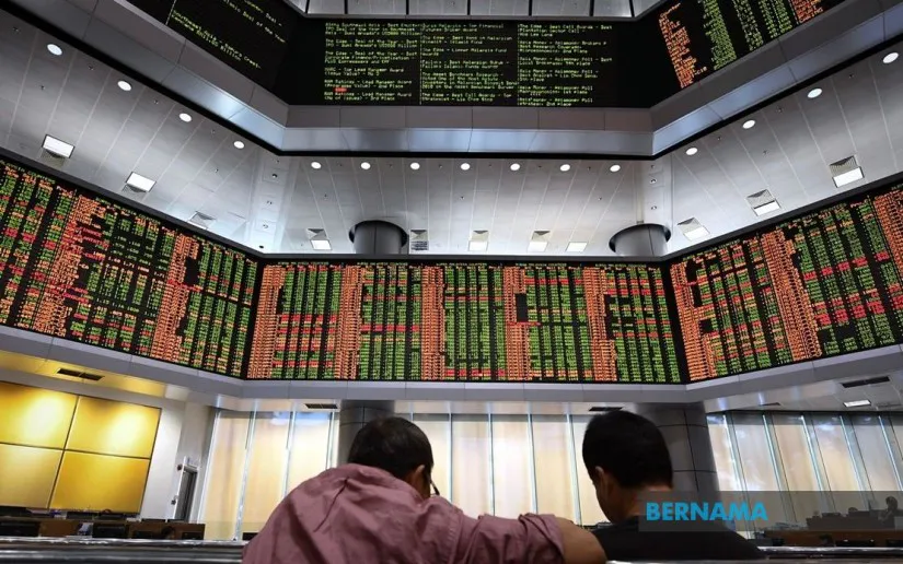 An electronic market board displaying share prices and index movements