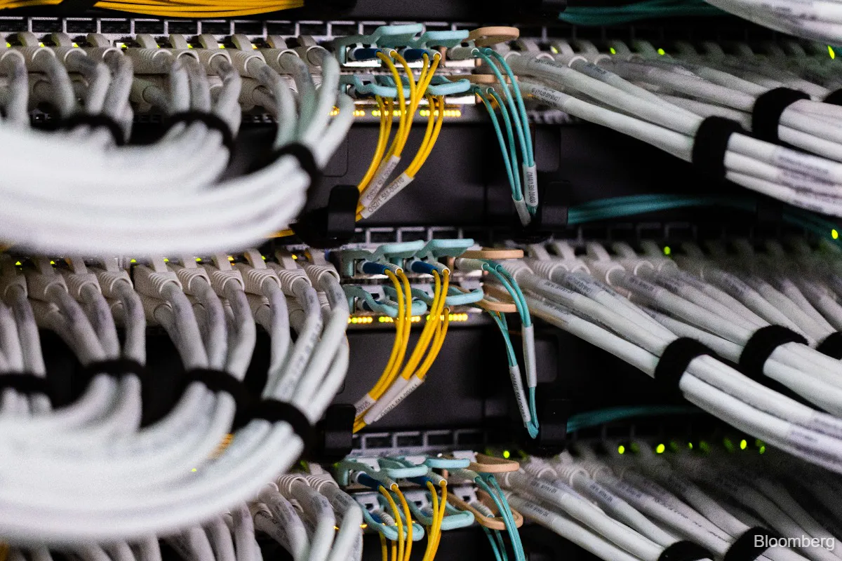 Rows of server racks inside a data centre