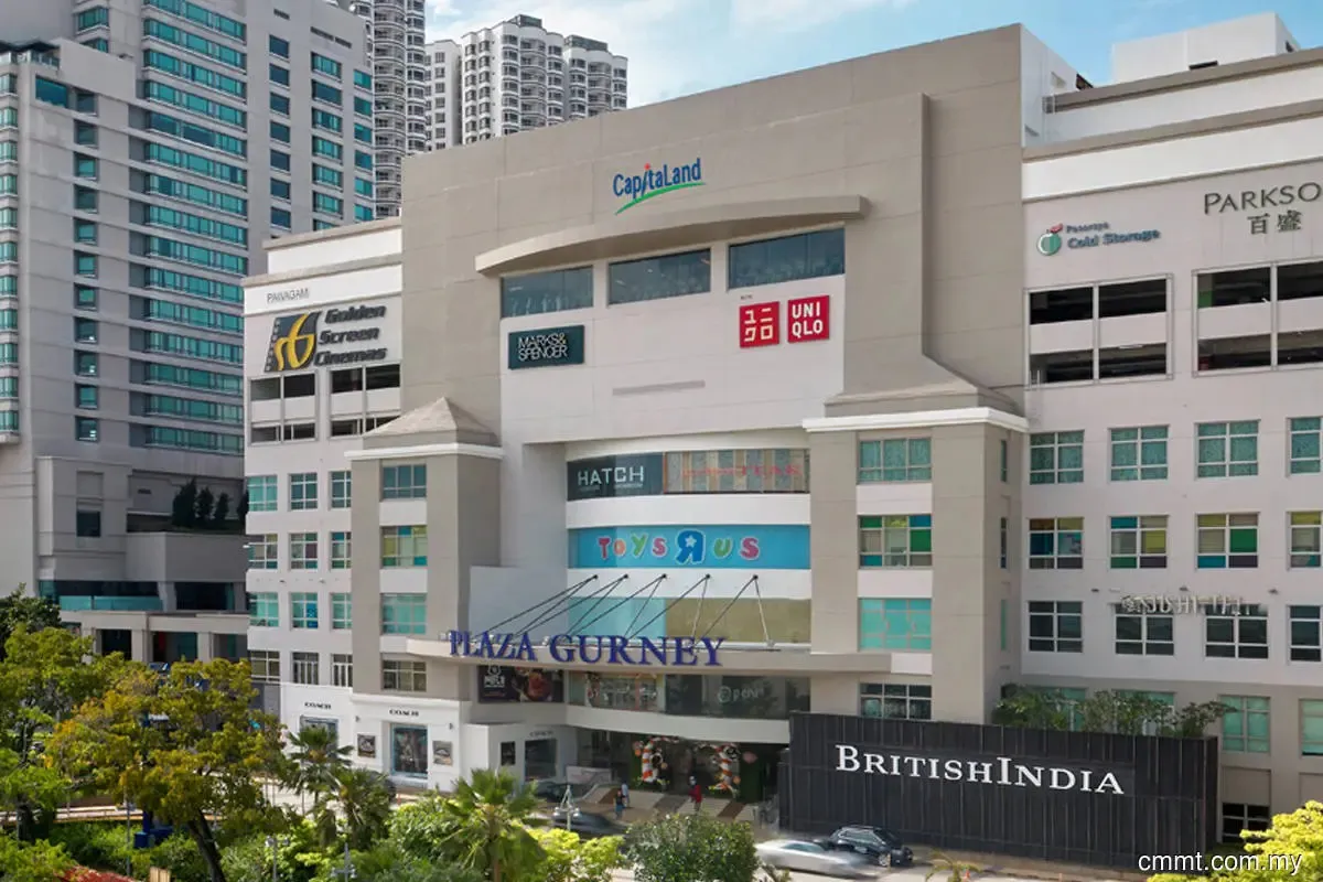 Retail shopfronts and walkways inside a shopping mall