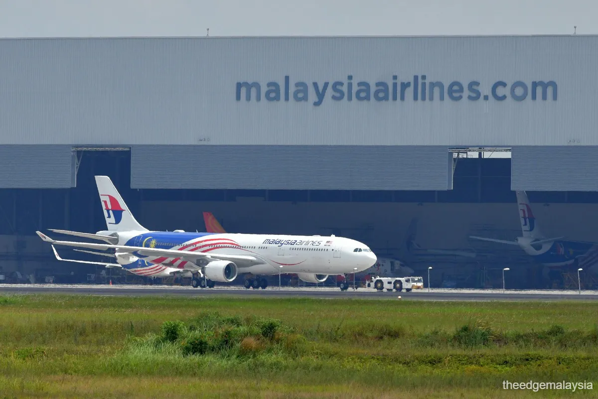 Illustration of aircraft and cargo containers at an airport