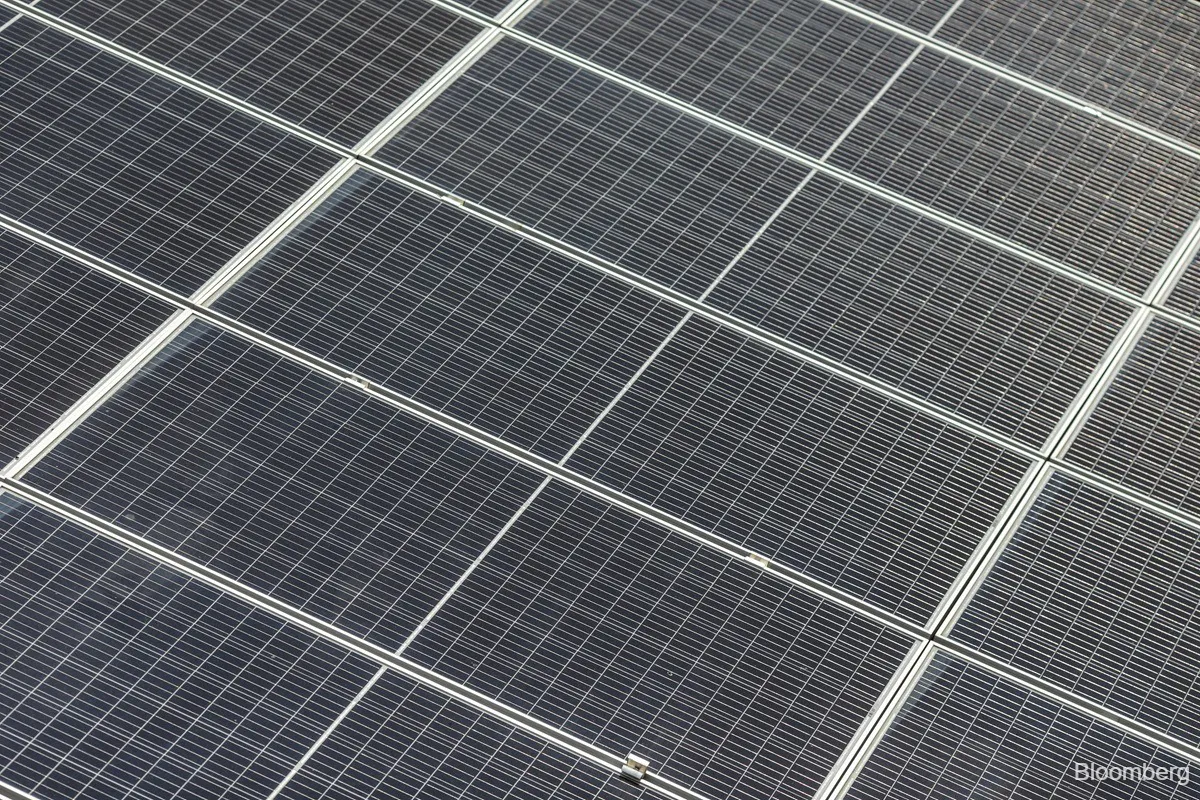 Solar panels arranged across a large field