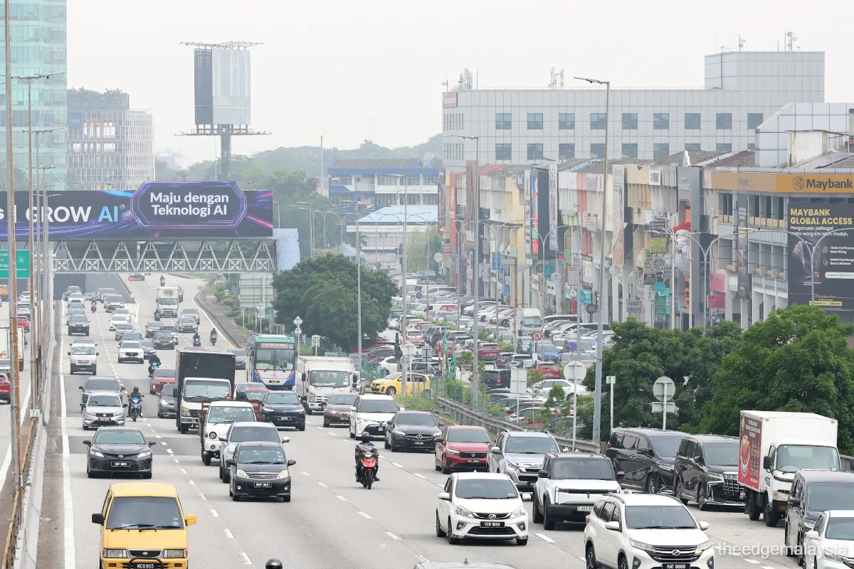 Traffic lights and vehicles at an urban road junction