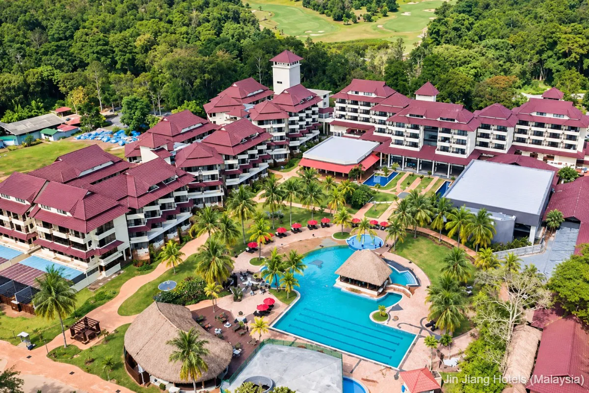 Illustration of a beachfront resort with guest rooms overlooking the sea