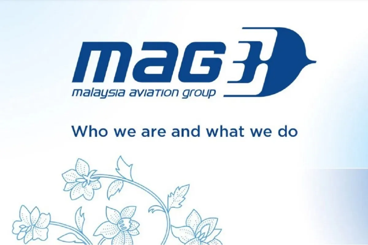Passenger aircraft parked beside airport terminal buildings