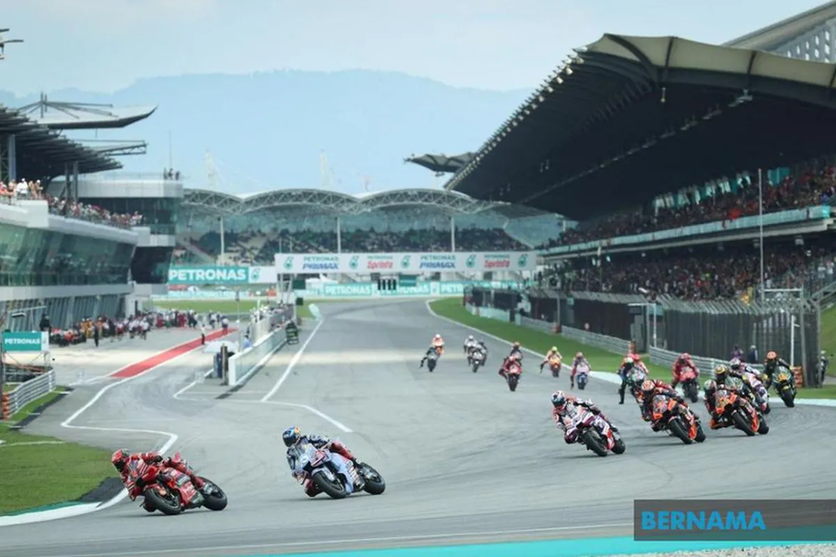 Motorcycle racing circuit with grandstands and trackside barriers