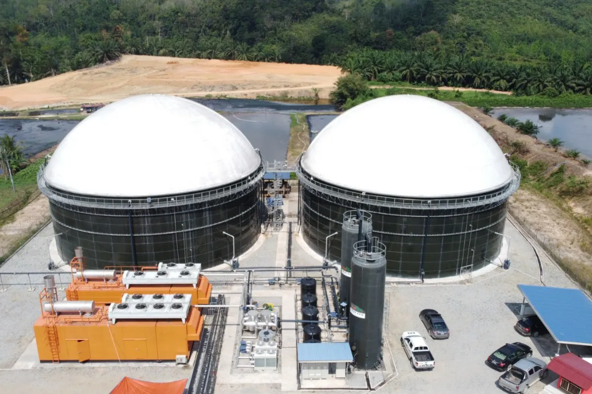 Biogas storage tanks and electricity generation equipment at an industrial facility